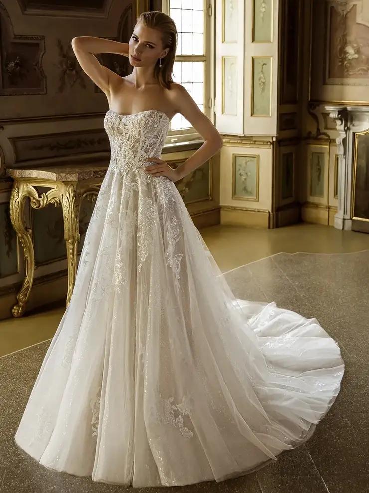 Model wearing a bridal white gown by Pen Liv