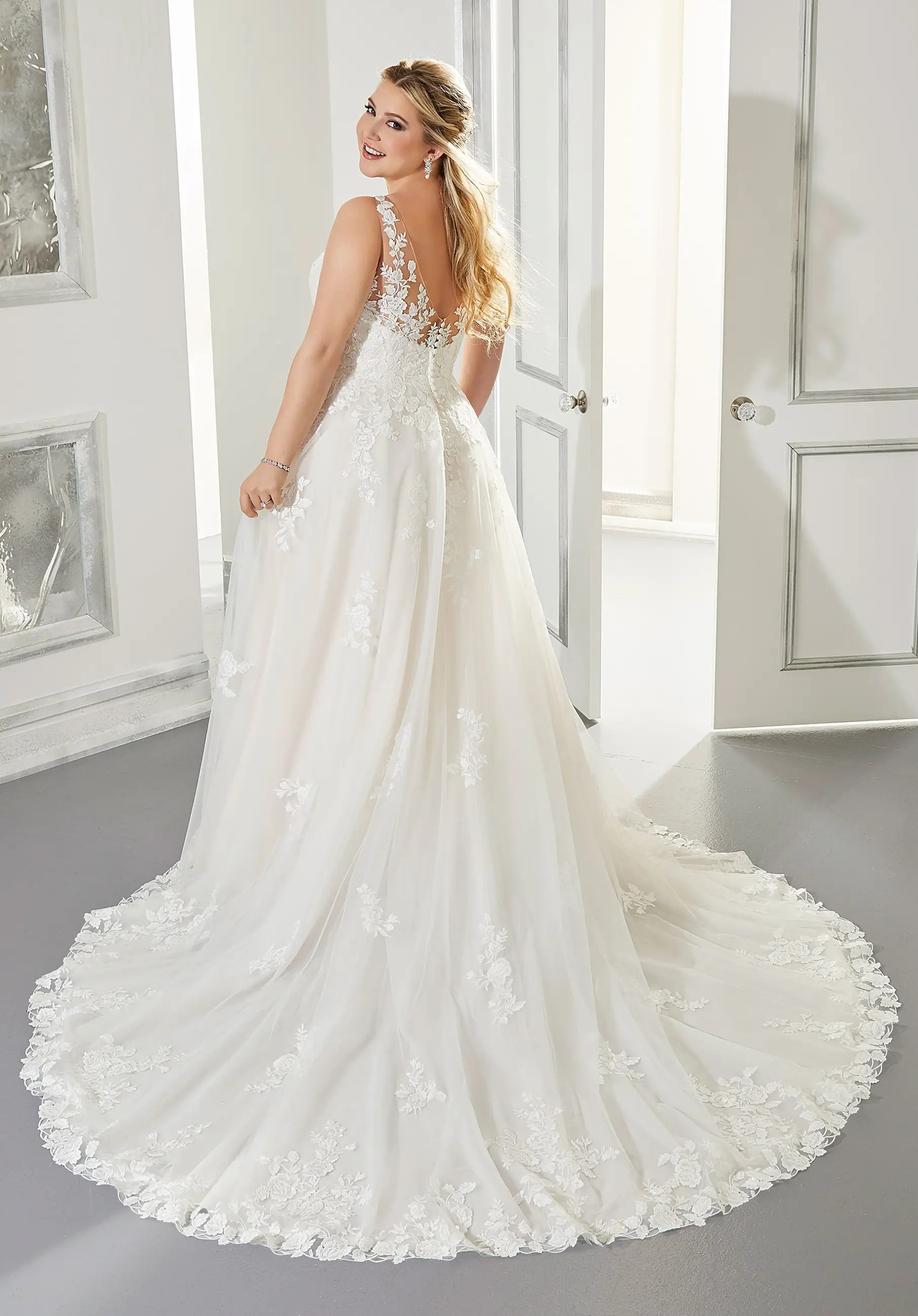Model wearing Morilee wedding dress