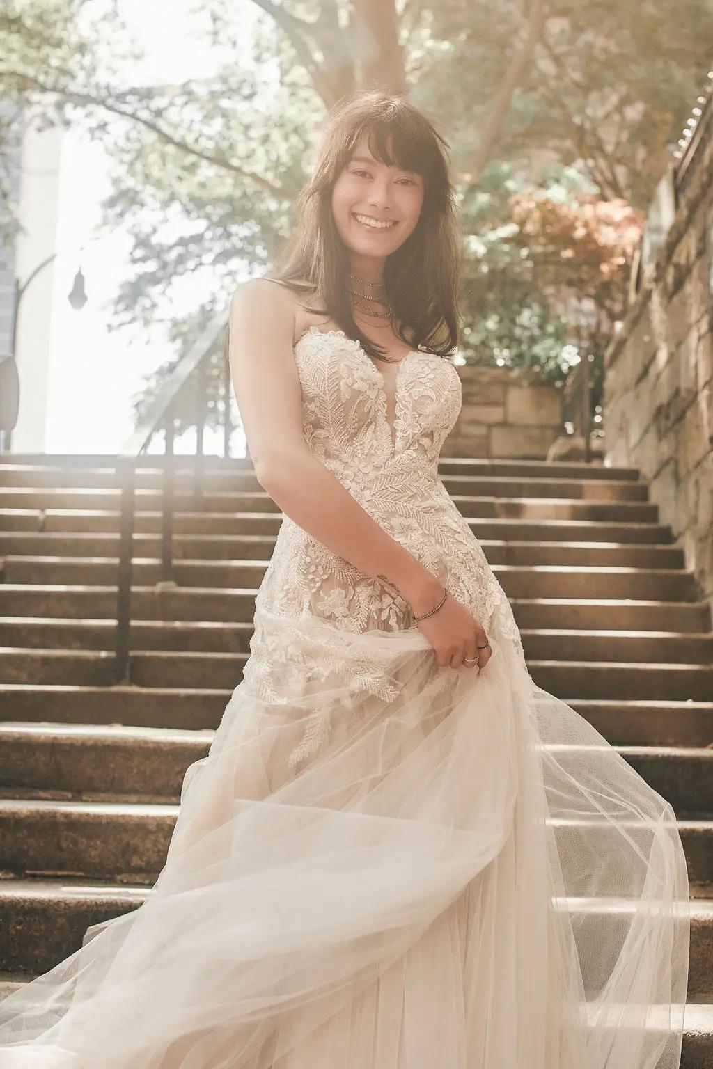 Model wearing Madison James wedding dress