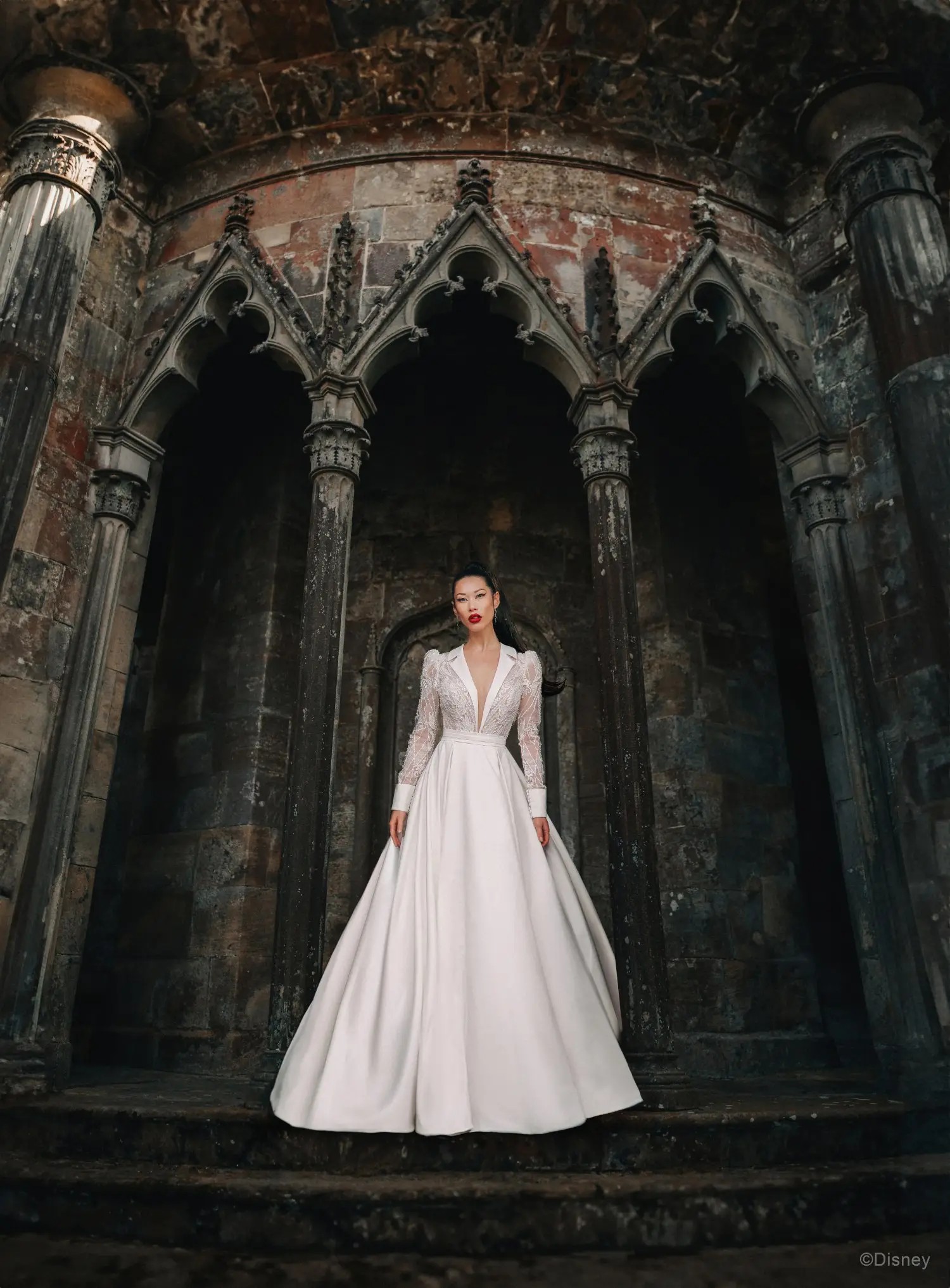 Model wearing white wedding dress