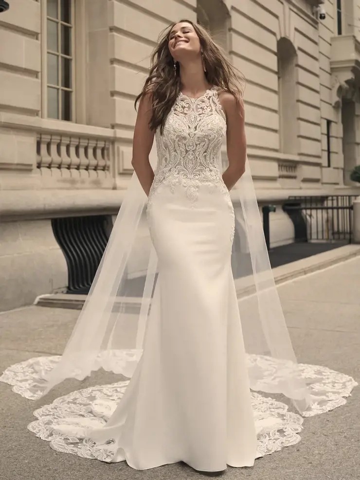 Model wearing a white gown