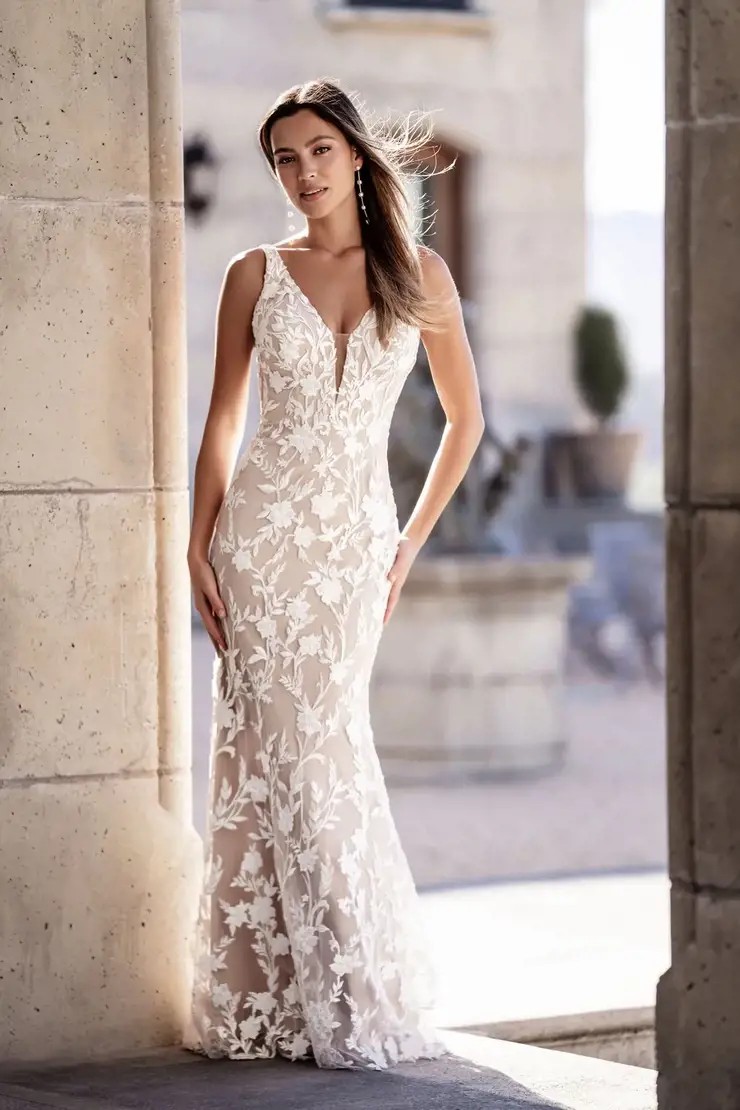 Model wearing a white gown