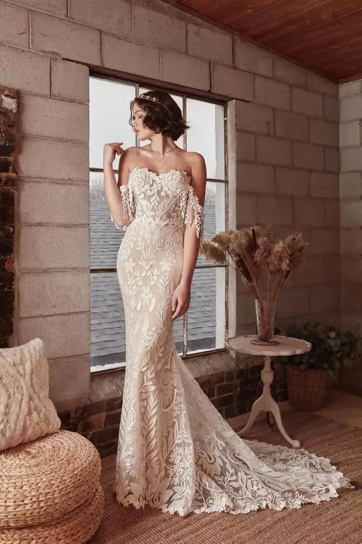 Model wearing Calla Blanche white wedding dress
