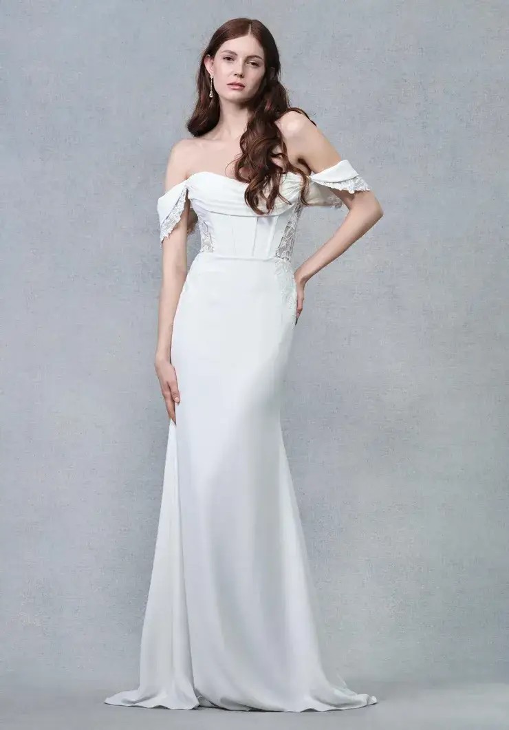 Model wearing white wedding dress