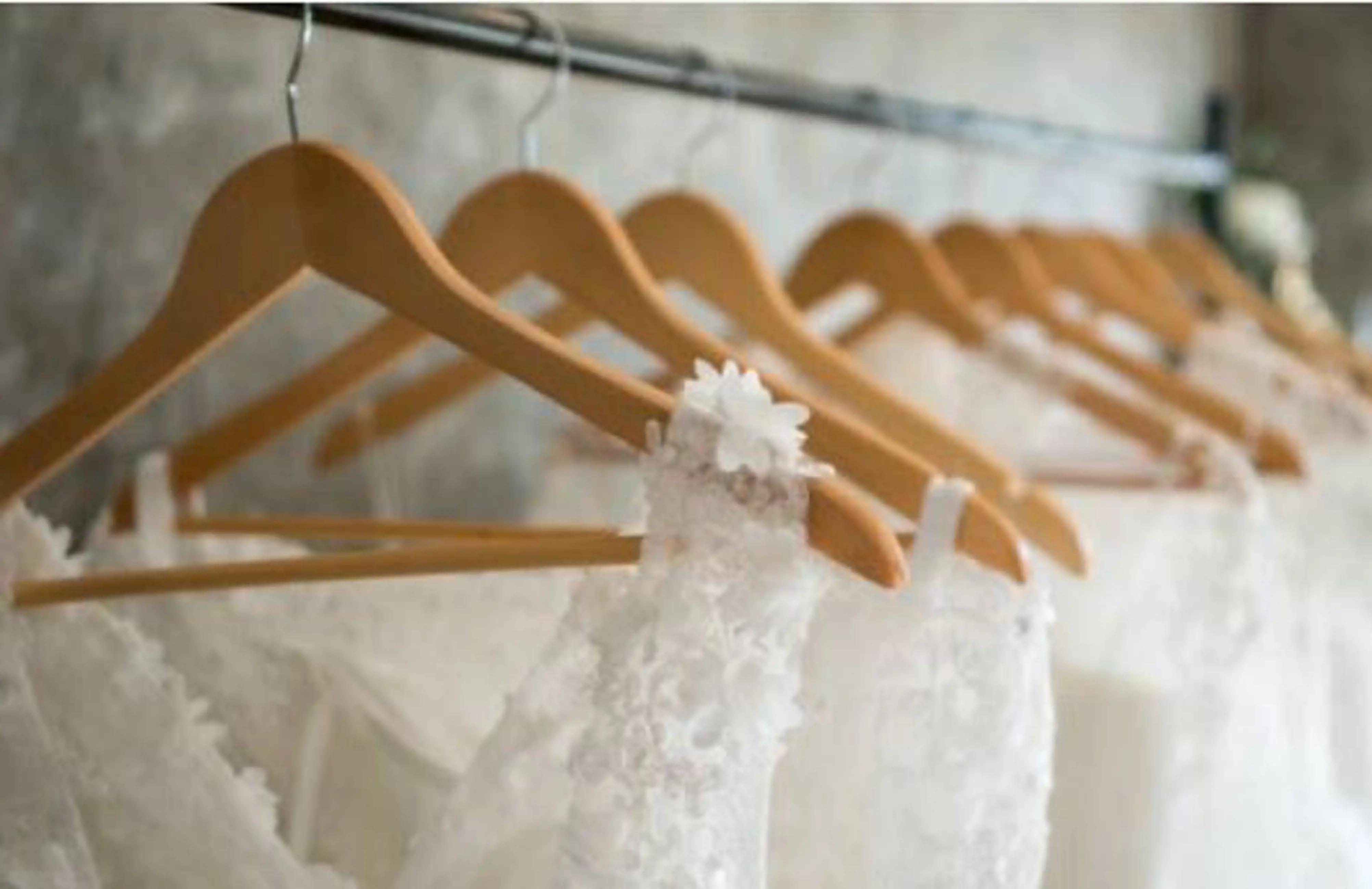 Image of bridal dresses on a rack