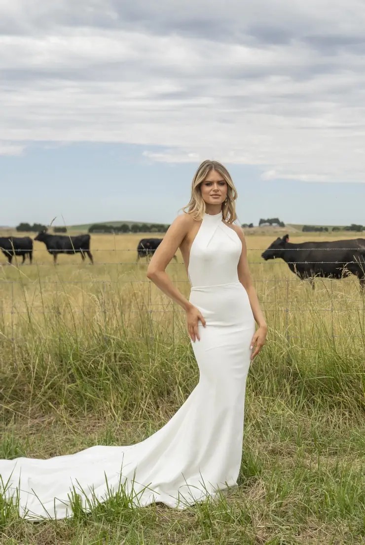 Model wearing white bridal gown