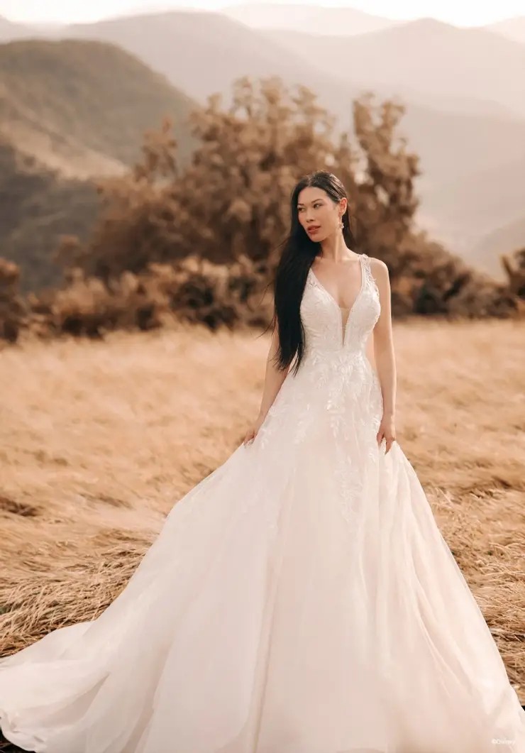 Model wearing white wedding dress
