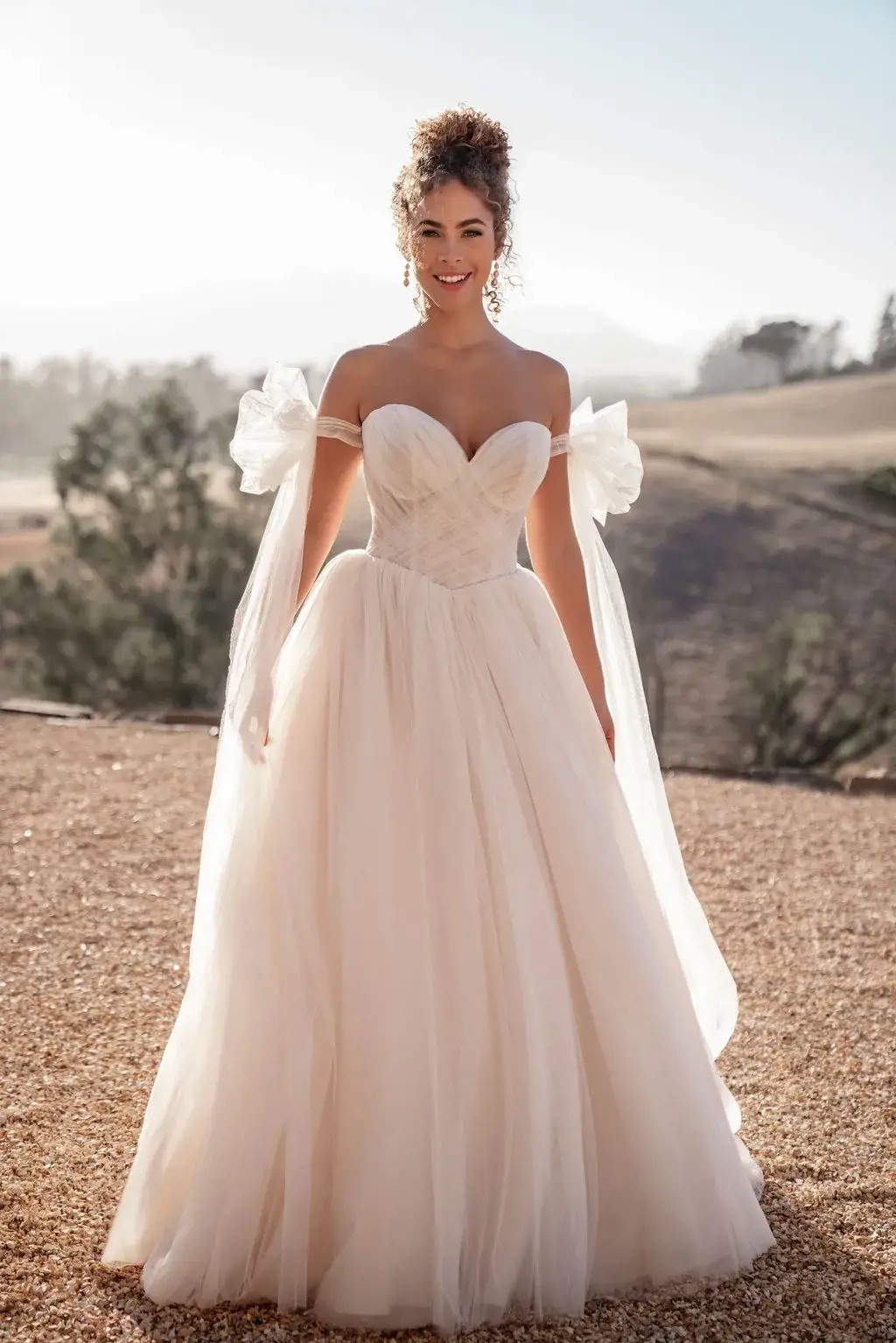 Model wearing white Allure bridals wedding dress