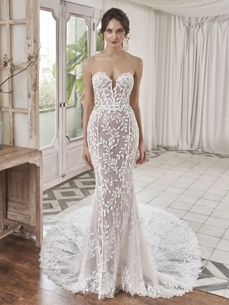 Model wearing a white dress