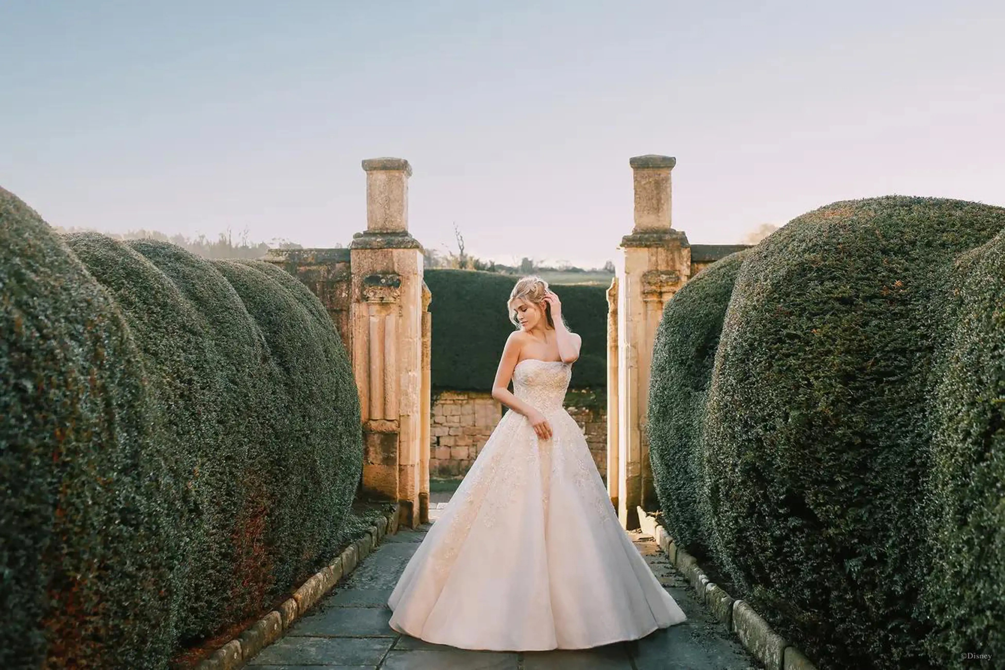 Model wearing Disney Allure Wedding Dress