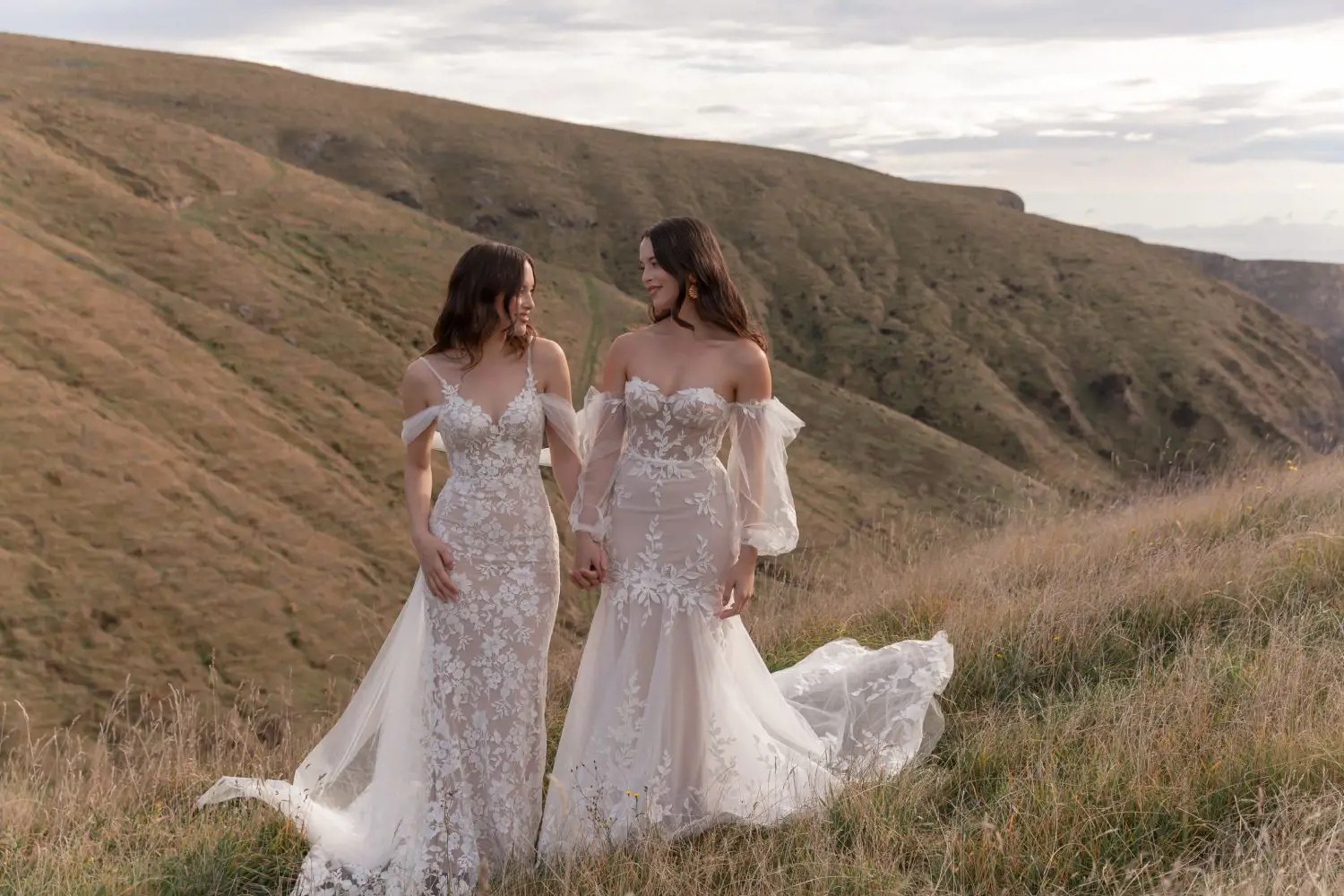 Models wearing a bridal gowns