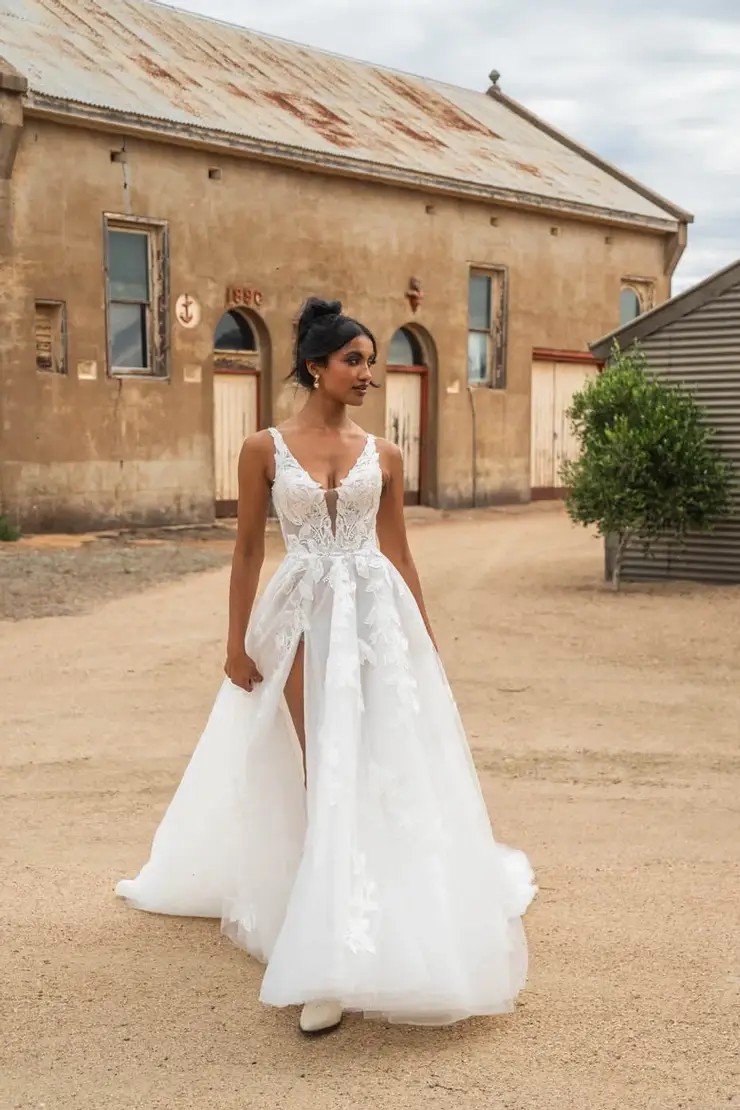 Model wearing white wedding gown