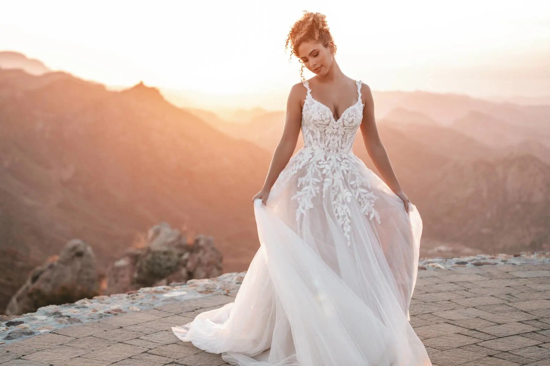 Model wearing a white bridal dress