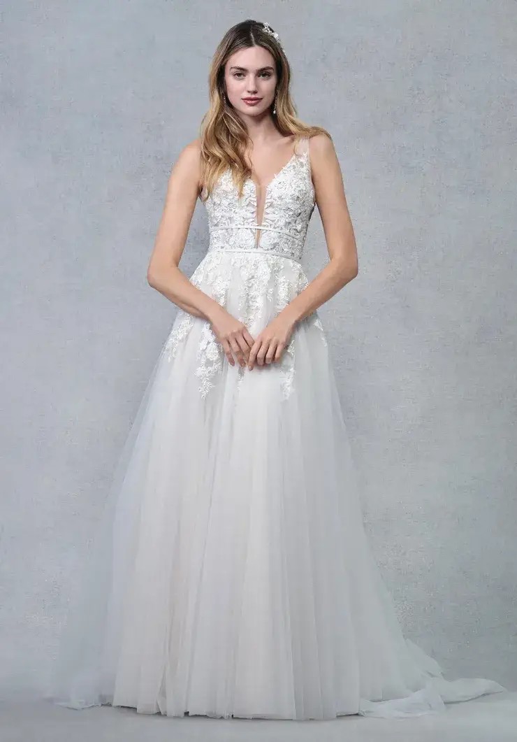 Model wearing white wedding dress