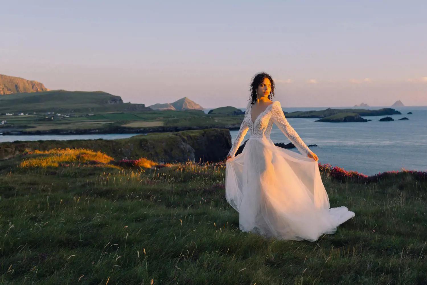 Model wearing a bridal gown on the grass