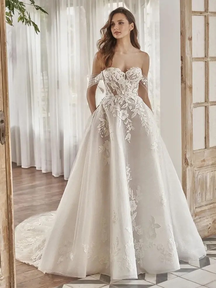 Model wearing a white gown