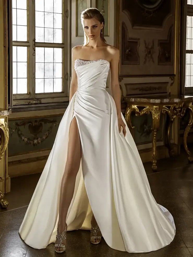 Model wearing a white gown