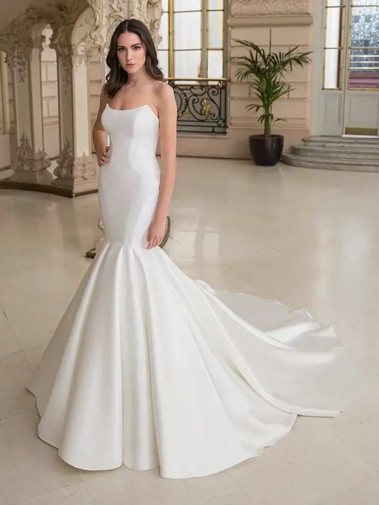 Model wearing a white gown