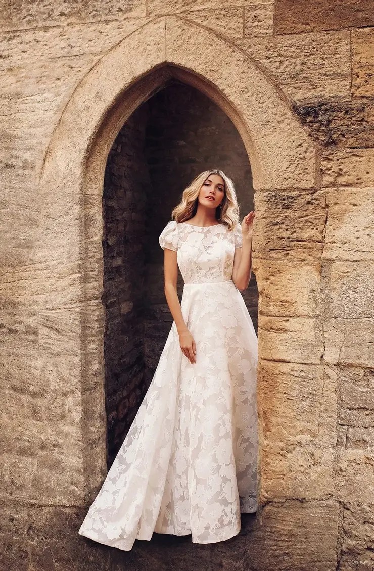Model wearing white wedding dress