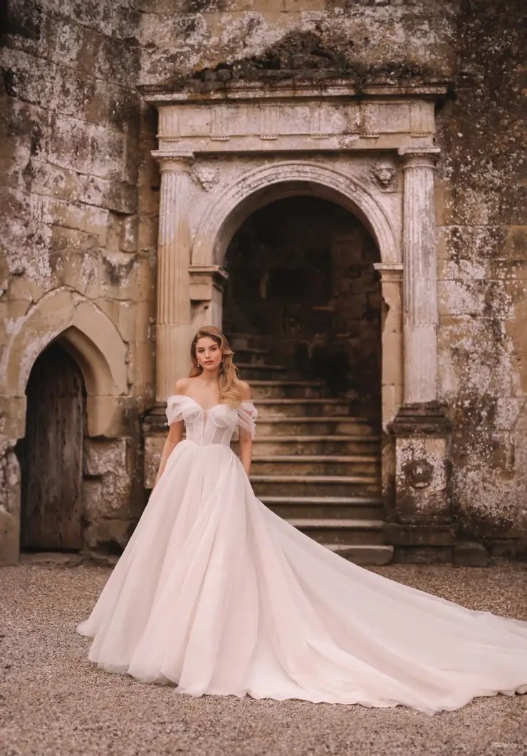 Model wearing white wedding dress