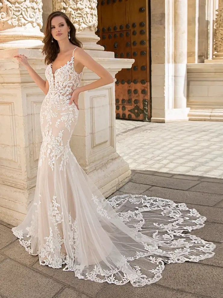 Model wearing a white gown