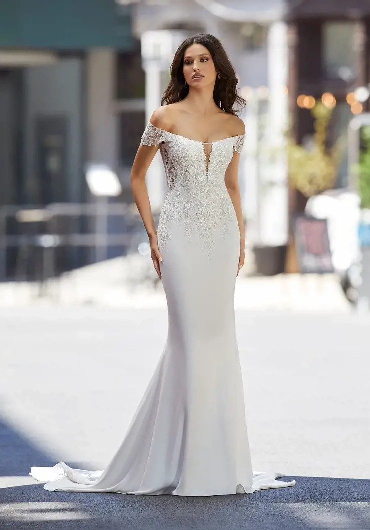 Model wearing a white dress