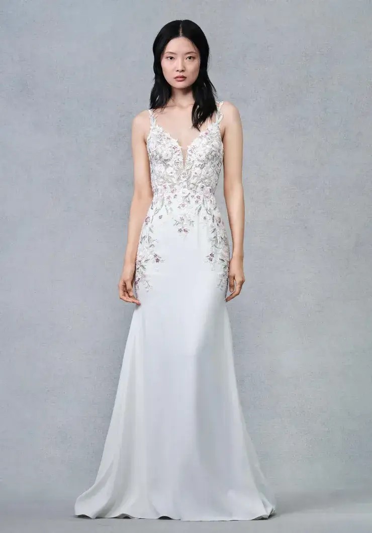 Model wearing white wedding dress