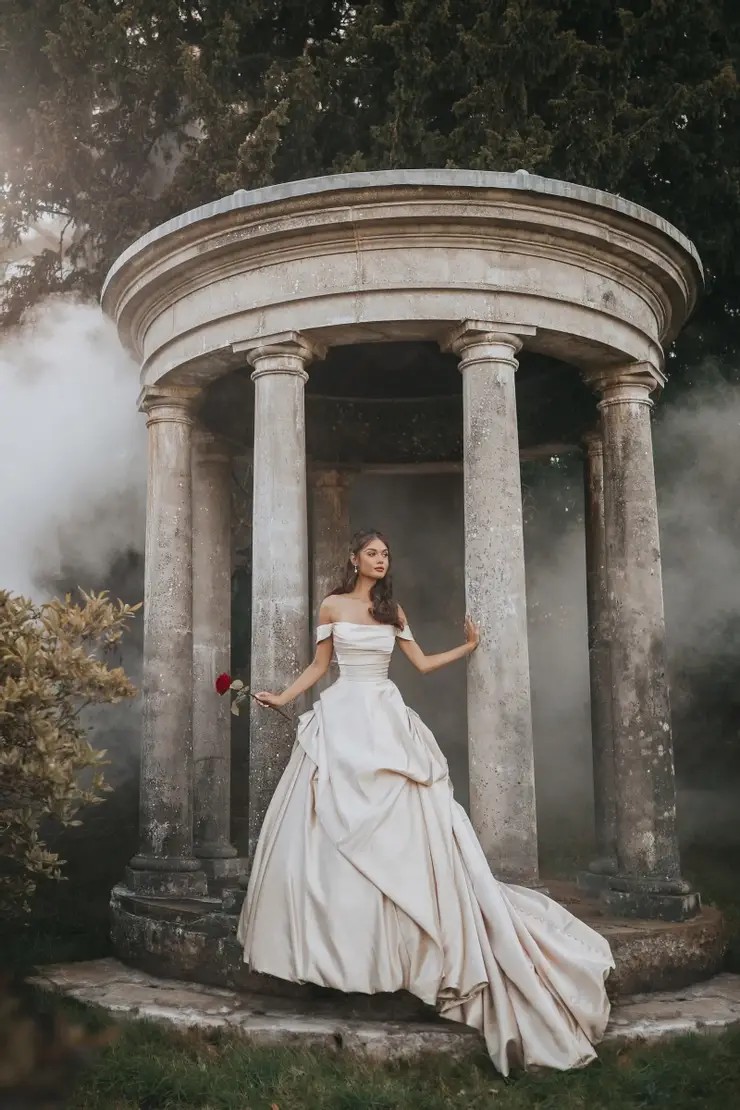Model wearing white wedding dress