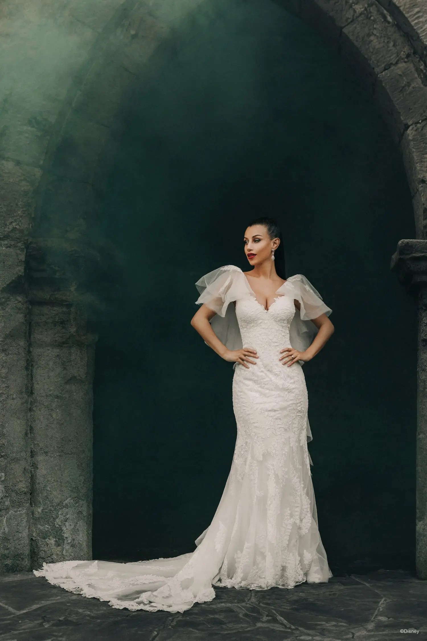 Model wearing white wedding dress