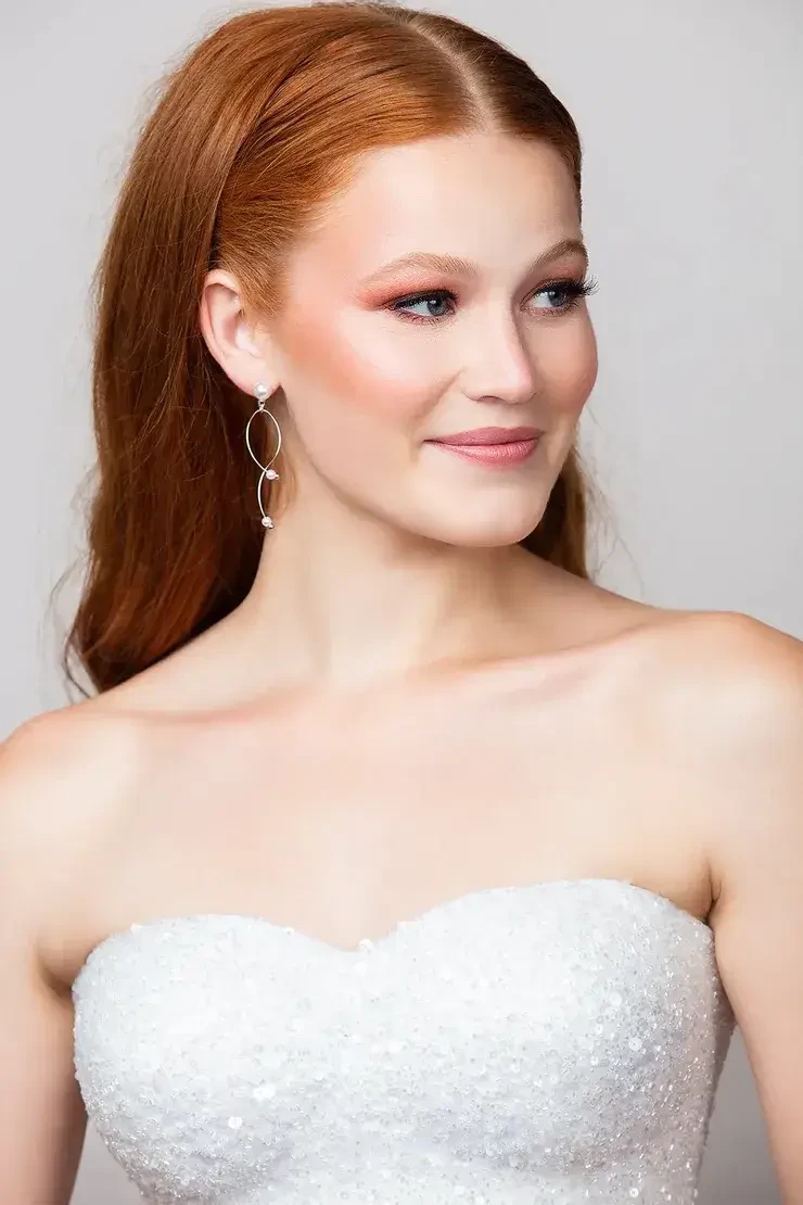 Model wearing bridal dress and bridal accessories