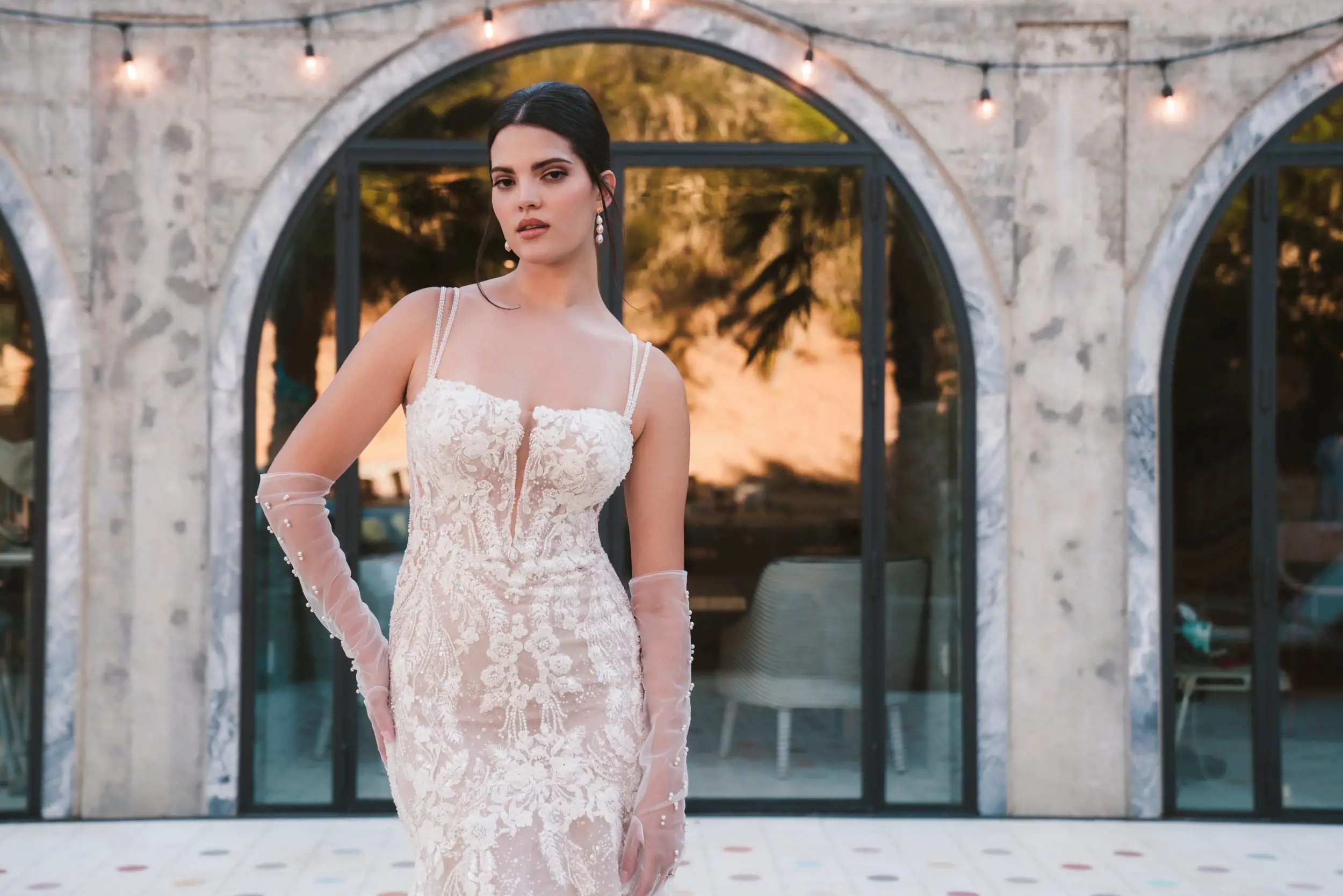 Model wearing a white bridal dress