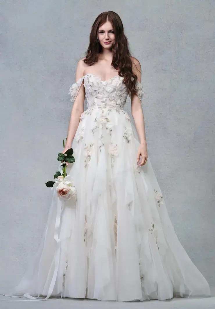 Model wearing white wedding dress