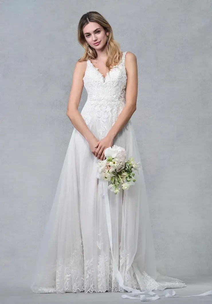 Model wearing white wedding dress